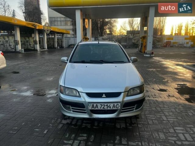 Серый Мицубиси Спейс Стар, объемом двигателя 1.6 л и пробегом 370 тыс. км за 2000 $, фото 1 на Automoto.ua