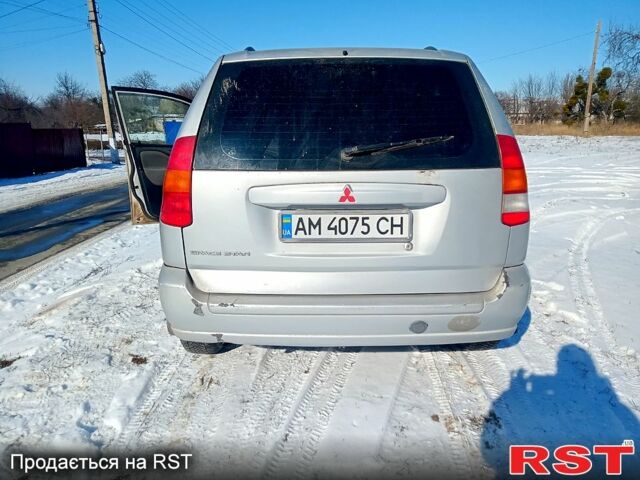 Серый Мицубиси Спейс Стар, объемом двигателя 1.6 л и пробегом 245 тыс. км за 3200 $, фото 1 на Automoto.ua