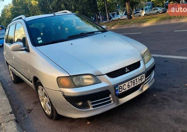 Серый Мицубиси Спейс Стар, объемом двигателя 1.3 л и пробегом 210 тыс. км за 2999 $, фото 1 на Automoto.ua