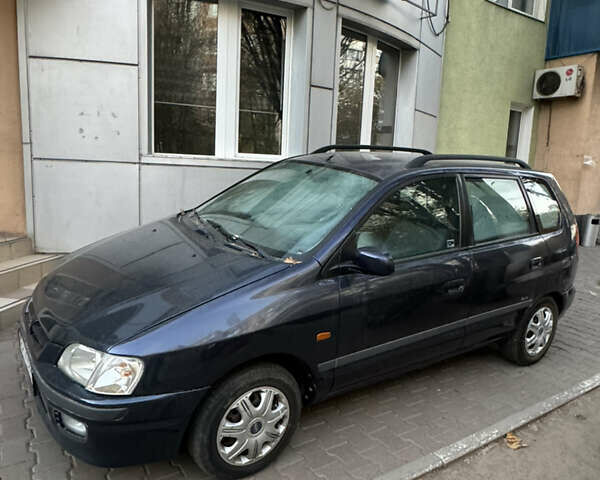 Синий Мицубиси Спейс Стар, объемом двигателя 1.3 л и пробегом 250 тыс. км за 2890 $, фото 1 на Automoto.ua