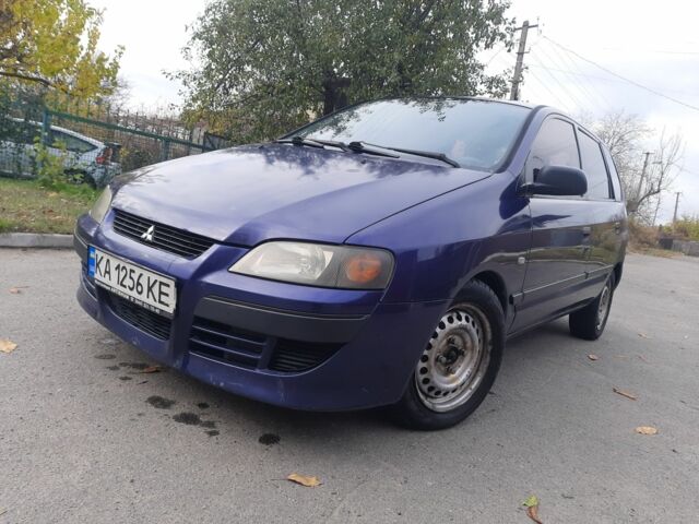 Синий Мицубиси Спейс Стар, объемом двигателя 1.6 л и пробегом 260 тыс. км за 2700 $, фото 1 на Automoto.ua