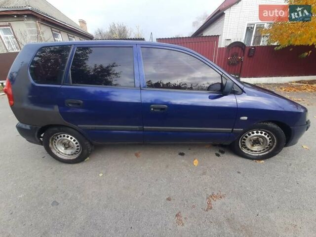 Синий Мицубиси Спейс Стар, объемом двигателя 1.6 л и пробегом 260 тыс. км за 2700 $, фото 1 на Automoto.ua