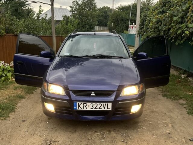 Синий Мицубиси Спейс Стар, объемом двигателя 1.9 л и пробегом 198 тыс. км за 1900 $, фото 1 на Automoto.ua