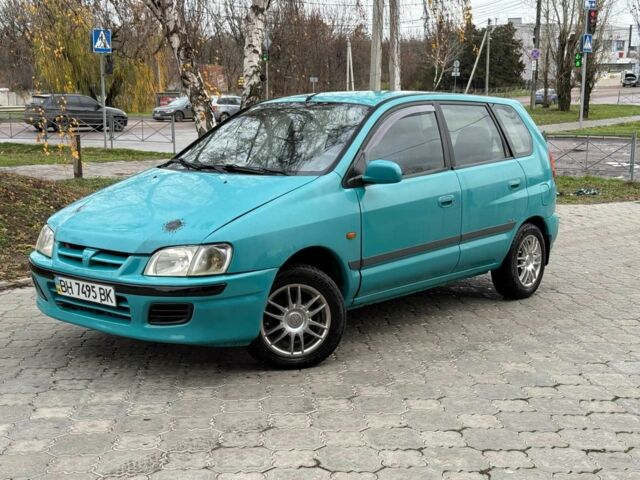 Зеленый Мицубиси Спейс Стар, объемом двигателя 1.3 л и пробегом 205 тыс. км за 3000 $, фото 1 на Automoto.ua