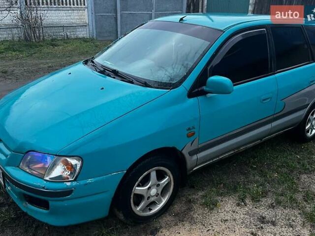 Зеленый Мицубиси Спейс Стар, объемом двигателя 1.3 л и пробегом 430 тыс. км за 2500 $, фото 1 на Automoto.ua