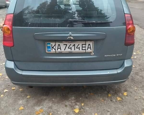Зеленый Мицубиси Спейс Стар, объемом двигателя 1.58 л и пробегом 330 тыс. км за 3300 $, фото 1 на Automoto.ua