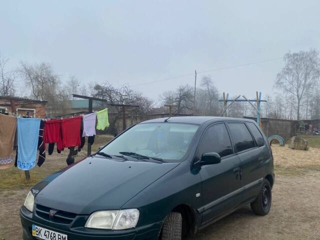 Зеленый Мицубиси Спейс Стар, объемом двигателя 1.3 л и пробегом 280 тыс. км за 1700 $, фото 1 на Automoto.ua