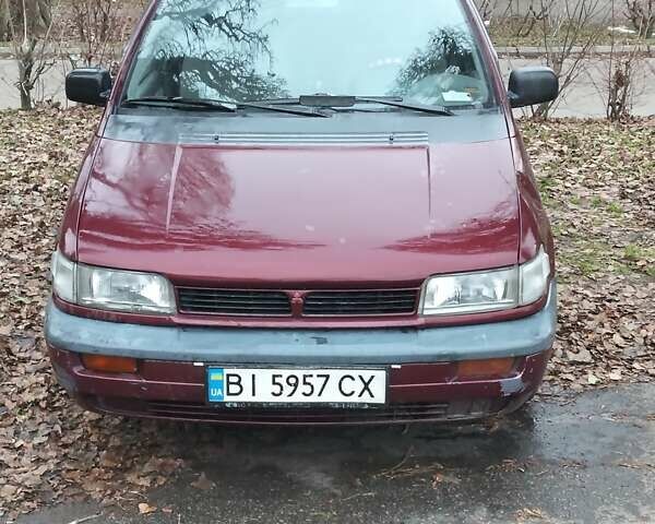 Красный Мицубиси Спейс Вагон, объемом двигателя 2 л и пробегом 300 тыс. км за 1700 $, фото 1 на Automoto.ua