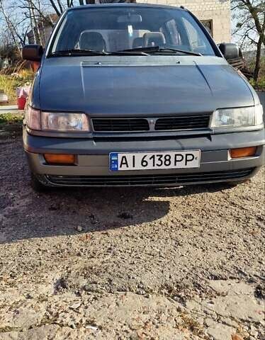 Серый Мицубиси Спейс Вагон, объемом двигателя 1.8 л и пробегом 410 тыс. км за 2000 $, фото 1 на Automoto.ua