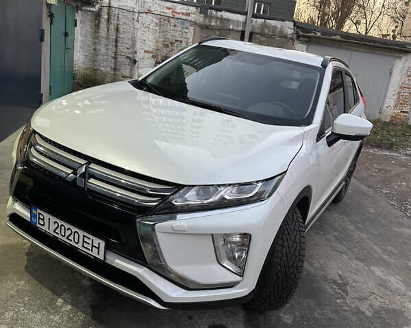 Белый Мицубиси Eclipse Cross, объемом двигателя 1.5 л и пробегом 21 тыс. км за 23750 $, фото 1 на Automoto.ua