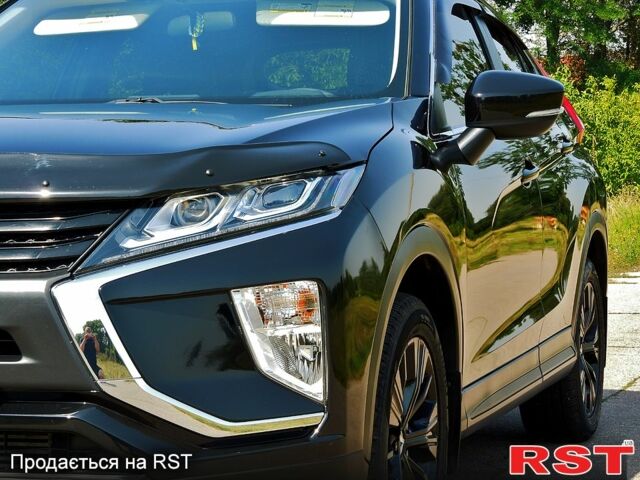 Черный Мицубиси Eclipse Cross, объемом двигателя 1.5 л и пробегом 128 тыс. км за 14800 $, фото 1 на Automoto.ua
