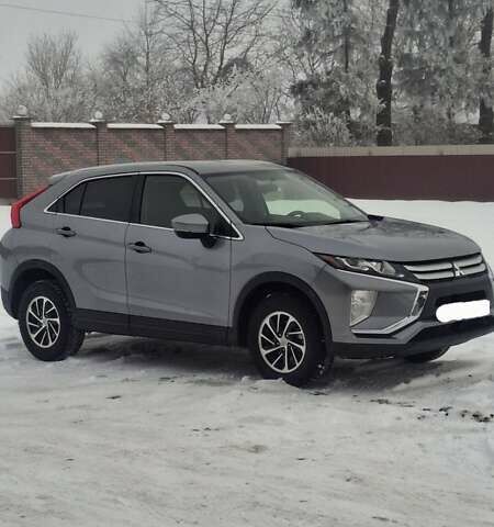 Серый Мицубиси Eclipse Cross, объемом двигателя 1.5 л и пробегом 115 тыс. км за 14999 $, фото 1 на Automoto.ua