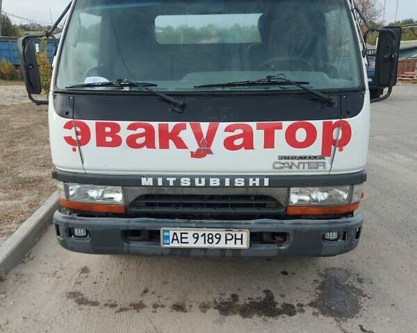 Белый Мицубиси Fuso Canter, объемом двигателя 0 л и пробегом 516 тыс. км за 10000 $, фото 1 на Automoto.ua