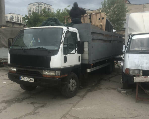 Белый Мицубиси Fuso Canter, объемом двигателя 3.91 л и пробегом 700 тыс. км за 4000 $, фото 1 на Automoto.ua