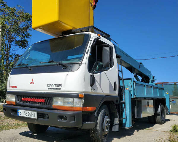 Белый Мицубиси Fuso Canter, объемом двигателя 3.91 л и пробегом 200 тыс. км за 32000 $, фото 1 на Automoto.ua