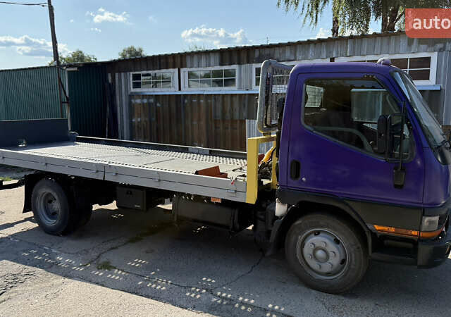 Фиолетовый Мицубиси Fuso Canter, объемом двигателя 3.91 л и пробегом 100 тыс. км за 12300 $, фото 1 на Automoto.ua