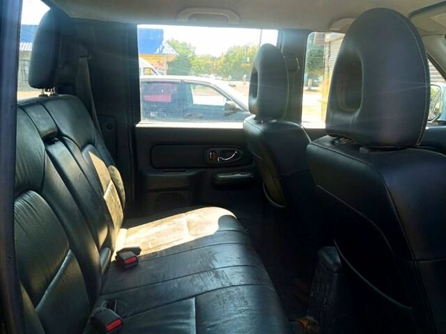 Черный Мицубиси L200, объемом двигателя 2.5 л и пробегом 142 тыс. км за 3700 $, фото 1 на Automoto.ua