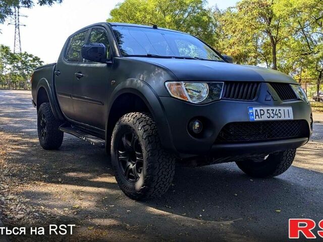 Чорний Міцубісі L200, об'ємом двигуна 2.5 л та пробігом 291 тис. км за 11999 $, фото 1 на Automoto.ua