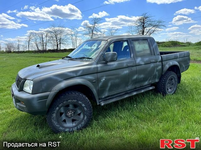 Мицубиси L200, объемом двигателя 2.5 л и пробегом 213 тыс. км за 4000 $, фото 1 на Automoto.ua