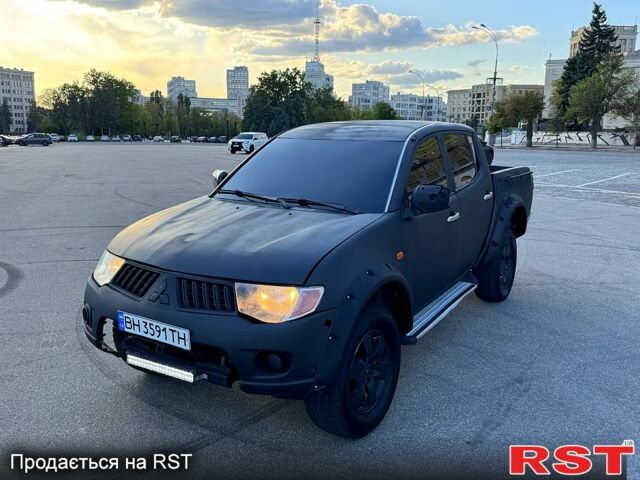 Синій Міцубісі L200, об'ємом двигуна 2.5 л та пробігом 140 тис. км за 8500 $, фото 1 на Automoto.ua
