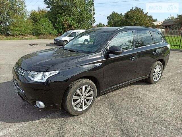 Черный Мицубиси Outlander PHEV, объемом двигателя 2 л и пробегом 116 тыс. км за 17500 $, фото 1 на Automoto.ua