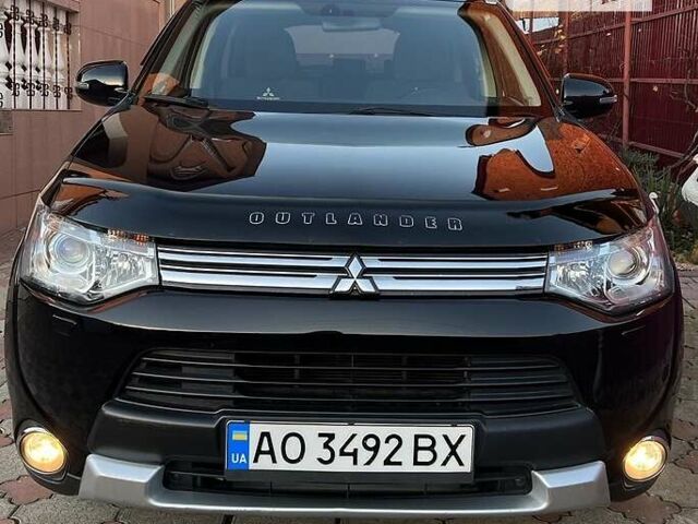 Чорний Міцубісі Outlander PHEV, об'ємом двигуна 2 л та пробігом 82 тис. км за 19300 $, фото 1 на Automoto.ua