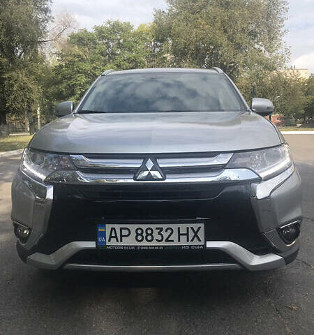 Серый Мицубиси Outlander PHEV, объемом двигателя 2 л и пробегом 57 тыс. км за 24000 $, фото 1 на Automoto.ua