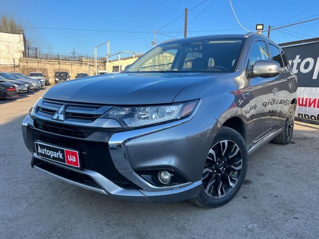 Серый Мицубиси Outlander PHEV, объемом двигателя 2 л и пробегом 176 тыс. км за 21990 $, фото 1 на Automoto.ua