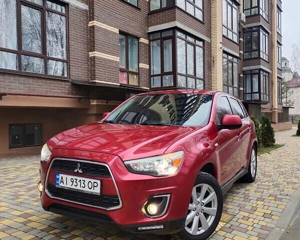 Красный Мицубиси Outlander Sport, объемом двигателя 2 л и пробегом 203 тыс. км за 9250 $, фото 1 на Automoto.ua