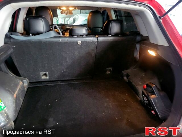 Красный Мицубиси Outlander Sport, объемом двигателя 2 л и пробегом 220 тыс. км за 11300 $, фото 1 на Automoto.ua