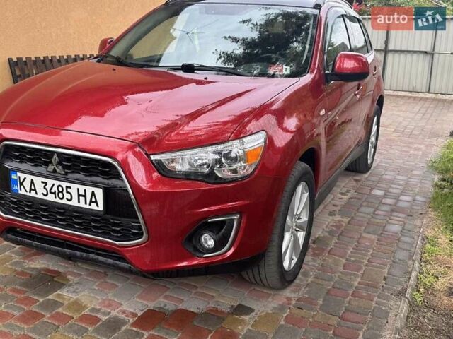 Красный Мицубиси Outlander Sport, объемом двигателя 2 л и пробегом 172 тыс. км за 12500 $, фото 1 на Automoto.ua