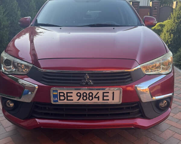Красный Мицубиси Outlander Sport, объемом двигателя 2 л и пробегом 65 тыс. км за 12500 $, фото 1 на Automoto.ua