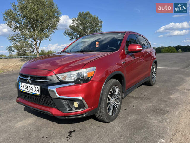 Красный Мицубиси Outlander Sport, объемом двигателя 2 л и пробегом 130 тыс. км за 14300 $, фото 1 на Automoto.ua