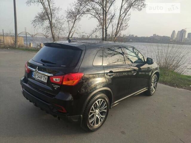 Мицубиси Outlander Sport, объемом двигателя 2.4 л и пробегом 55 тыс. км за 14000 $, фото 1 на Automoto.ua