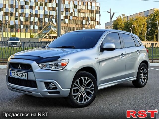 Серый Мицубиси Outlander Sport, объемом двигателя 2 л и пробегом 158 тыс. км за 9650 $, фото 1 на Automoto.ua