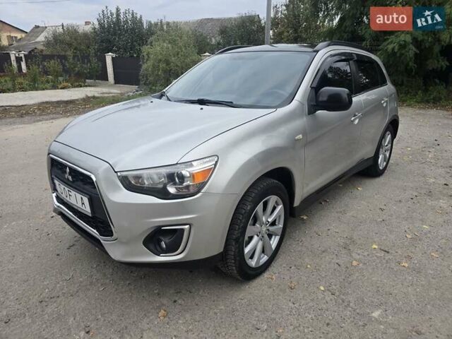 Серый Мицубиси Outlander Sport, объемом двигателя 2 л и пробегом 248 тыс. км за 9999 $, фото 1 на Automoto.ua