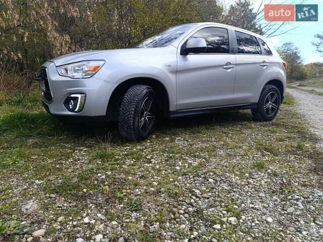 Серый Мицубиси Outlander Sport, объемом двигателя 2 л и пробегом 145 тыс. км за 11200 $, фото 1 на Automoto.ua