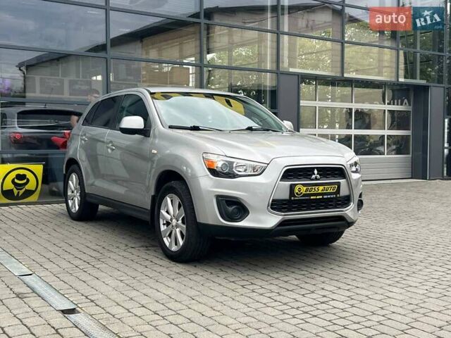 Серый Мицубиси Outlander Sport, объемом двигателя 2 л и пробегом 228 тыс. км за 11000 $, фото 1 на Automoto.ua