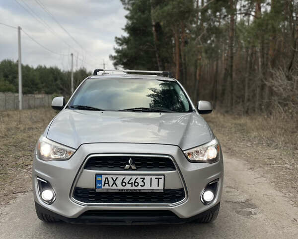 Серый Мицубиси Outlander Sport, объемом двигателя 2 л и пробегом 210 тыс. км за 10000 $, фото 1 на Automoto.ua
