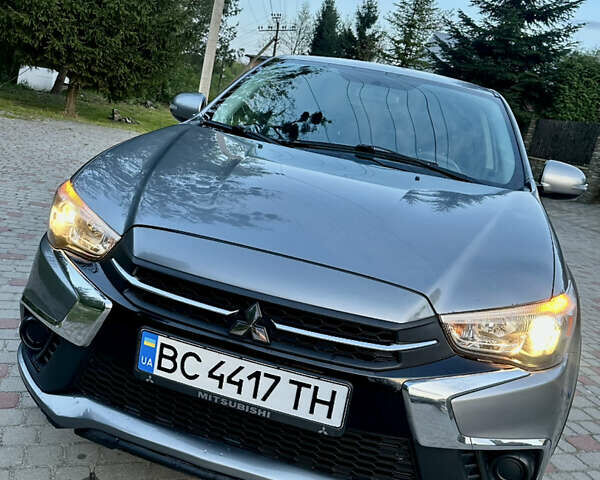 Серый Мицубиси Outlander Sport, объемом двигателя 2 л и пробегом 151 тыс. км за 13000 $, фото 1 на Automoto.ua