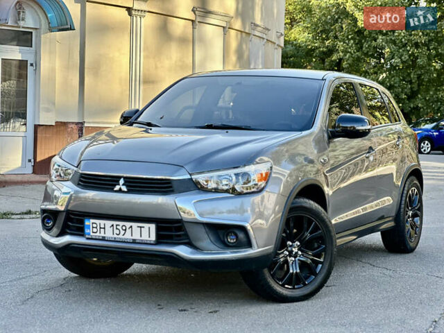 Серый Мицубиси Outlander Sport, объемом двигателя 2 л и пробегом 71 тыс. км за 13900 $, фото 1 на Automoto.ua