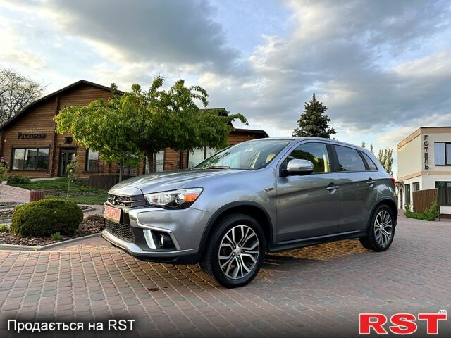Серый Мицубиси Outlander Sport, объемом двигателя 24 л и пробегом 190 тыс. км за 12999 $, фото 1 на Automoto.ua
