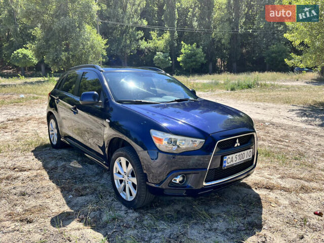 Синий Мицубиси Outlander Sport, объемом двигателя 2 л и пробегом 232 тыс. км за 9999 $, фото 1 на Automoto.ua