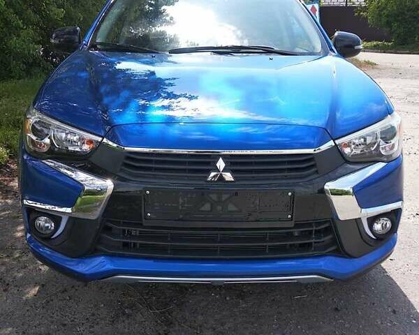 Синий Мицубиси Outlander Sport, объемом двигателя 2 л и пробегом 136 тыс. км за 13800 $, фото 1 на Automoto.ua