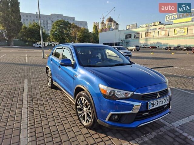 Синий Мицубиси Outlander Sport, объемом двигателя 2 л и пробегом 42 тыс. км за 15500 $, фото 1 на Automoto.ua