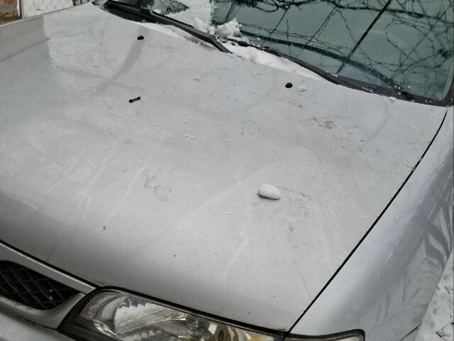 Серый Ниссан Альмера Классик, объемом двигателя 1.6 л и пробегом 205 тыс. км за 2600 $, фото 1 на Automoto.ua