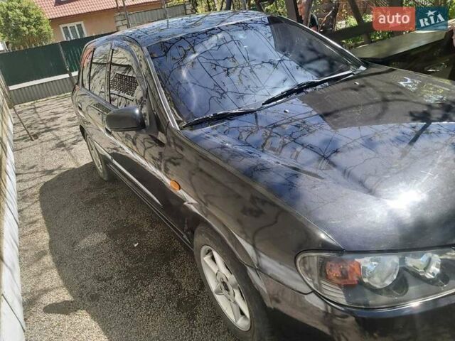 Черный Ниссан Альмера, объемом двигателя 1.5 л и пробегом 360 тыс. км за 2000 $, фото 1 на Automoto.ua