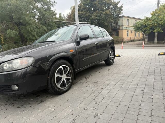 Чорний Ніссан Альмера, об'ємом двигуна 1.5 л та пробігом 183 тис. км за 3950 $, фото 1 на Automoto.ua