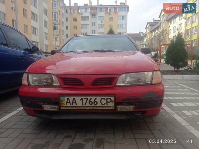 Красный Ниссан Альмера, объемом двигателя 1.39 л и пробегом 332 тыс. км за 1300 $, фото 1 на Automoto.ua