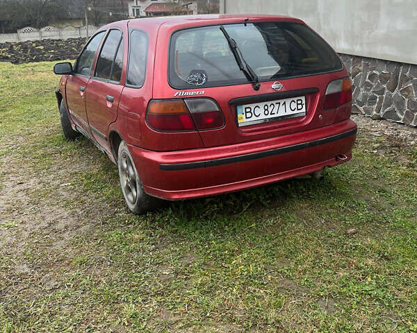 Красный Ниссан Альмера, объемом двигателя 1.4 л и пробегом 250 тыс. км за 860 $, фото 1 на Automoto.ua